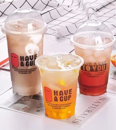 Clear plastic cups for cold drinks with flat and dome lids