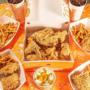 Large fried chicken sharing box packaging with combo meal presentation