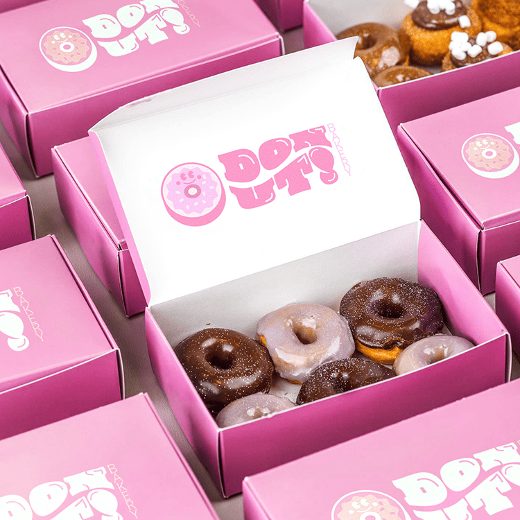 Custom donut boxes wholesale with printed logo and bakery packaging design