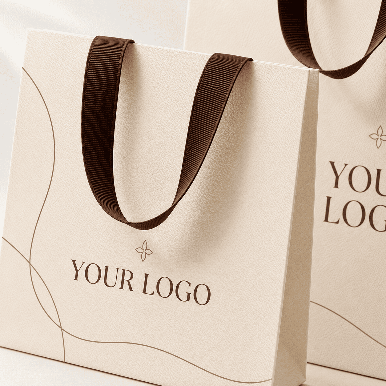 Close-up of textured custom paper bag with brown ribbon handle